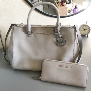 Michael Kors gray purse and matching wallet
